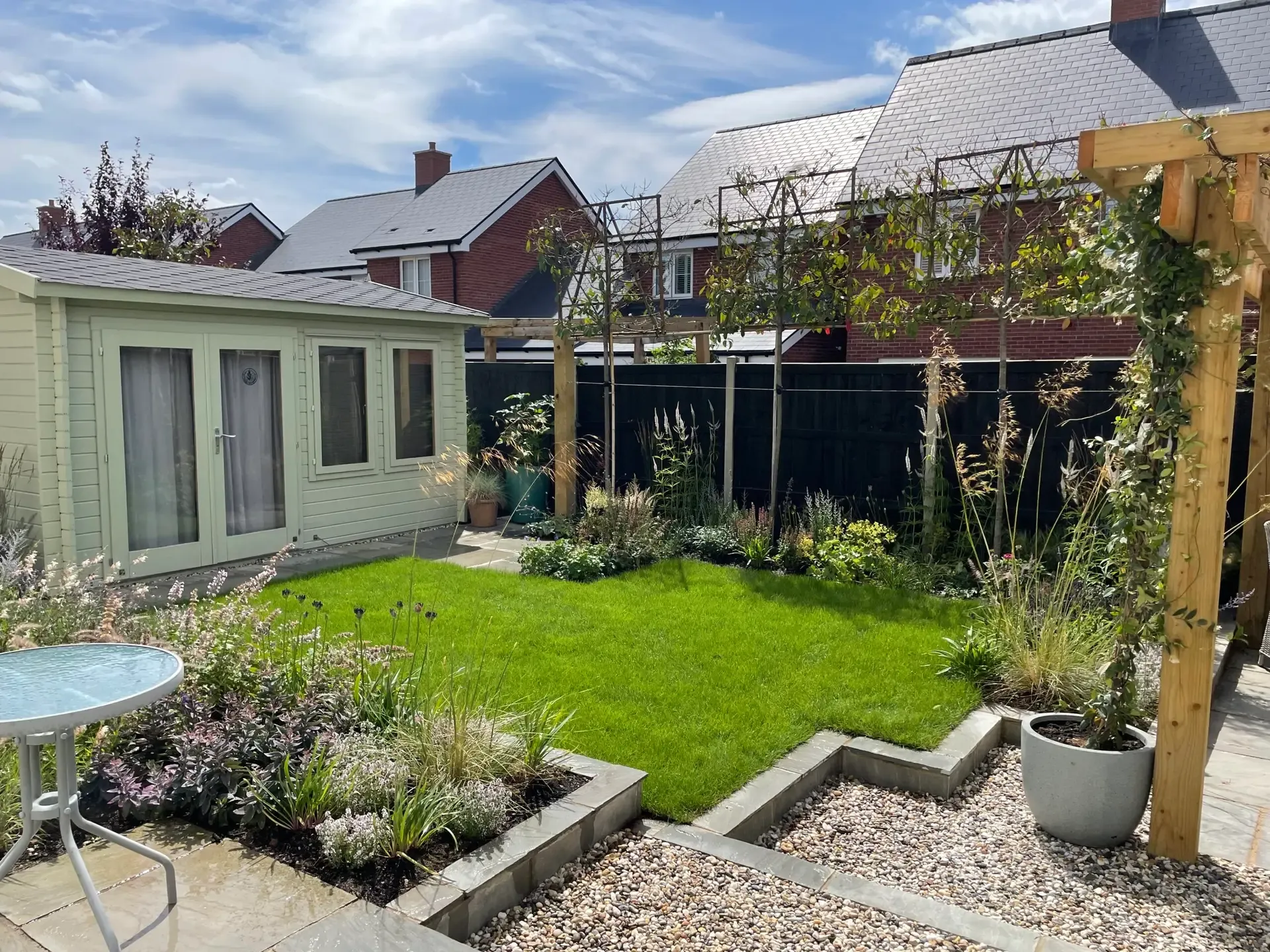 Timber pergola and seating terrace in Beaulieu garden design