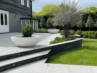 Raised terrace overlooking open fields and countryside in Danbury, Essex