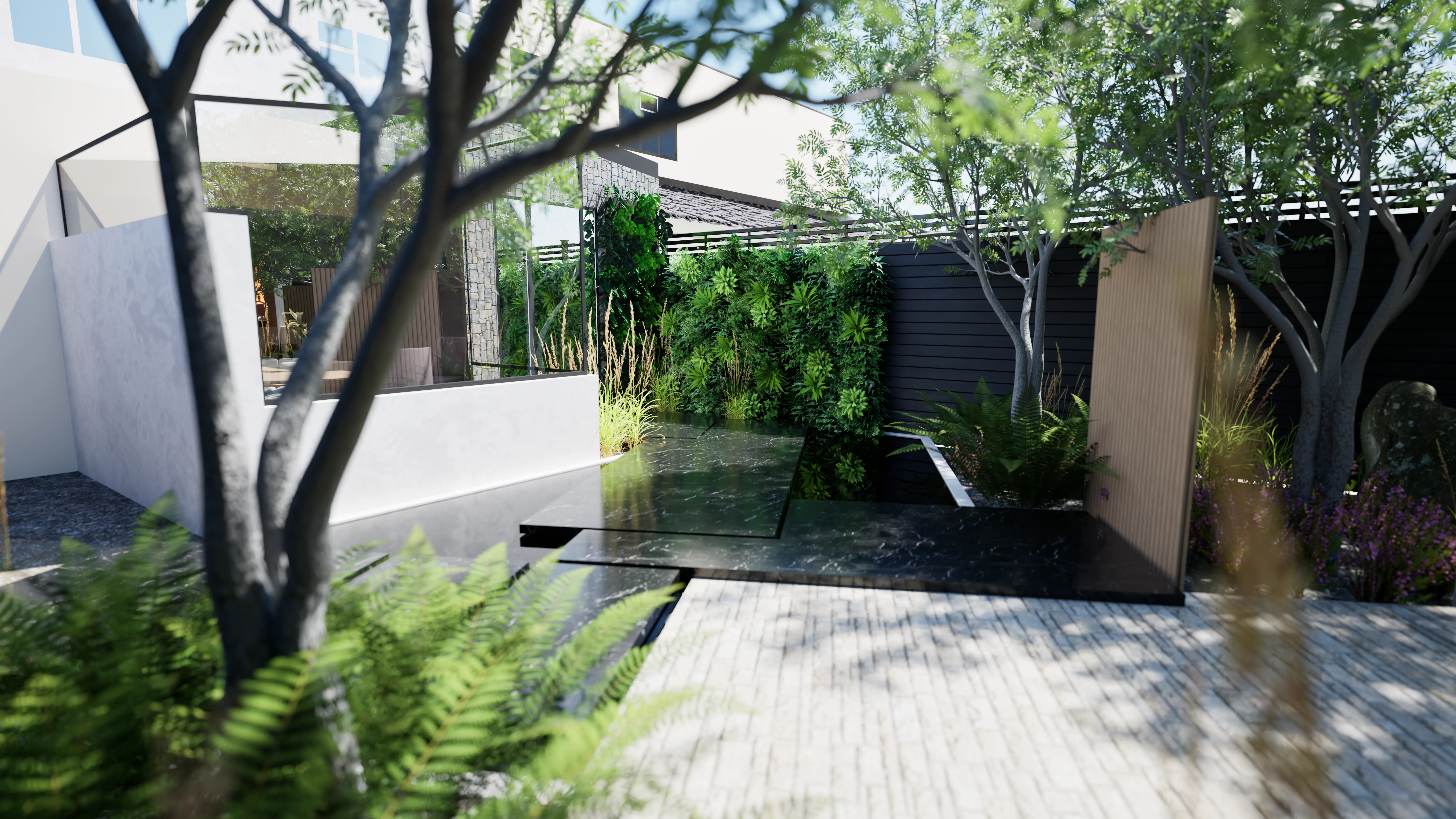 Calm courtyard with layered planting and dark stone.